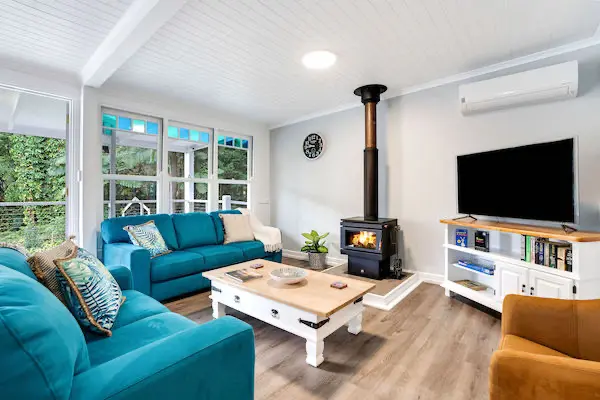 Comfortable couches to watch TV or enjoy the fireplace